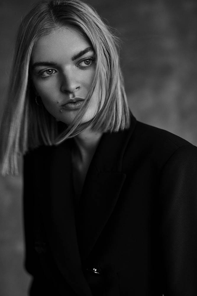 Model Juliane Grüner in black and white fashion editorial by danish fashion photographer Henrik Adamsen
